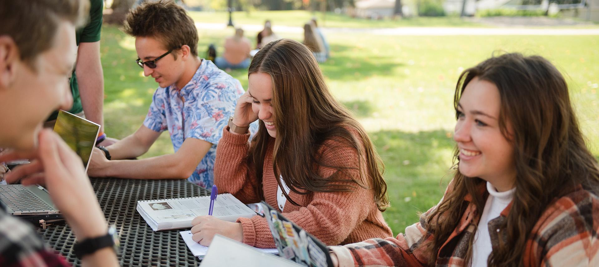 Group of students studying outdoors